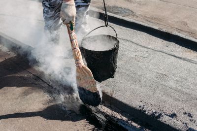 Applying Tar Asphalt